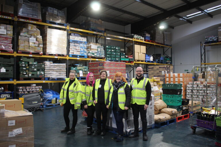 Metro Rod volunteers pose for a picture at FareShare
