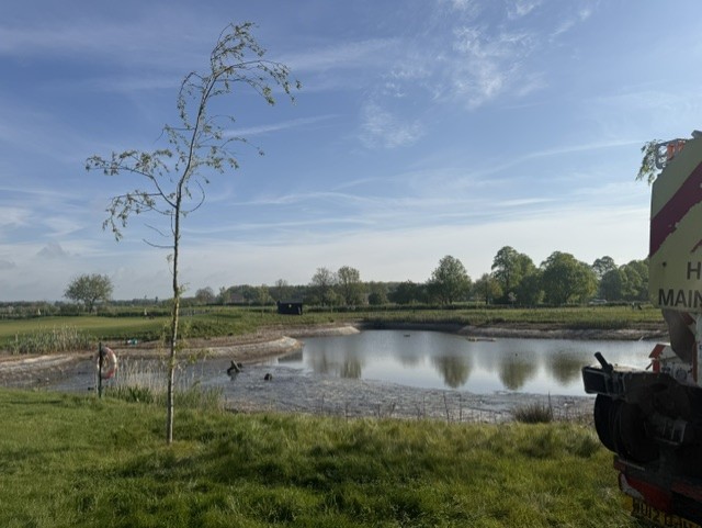 A pond before being emptied and treated with silt removal.