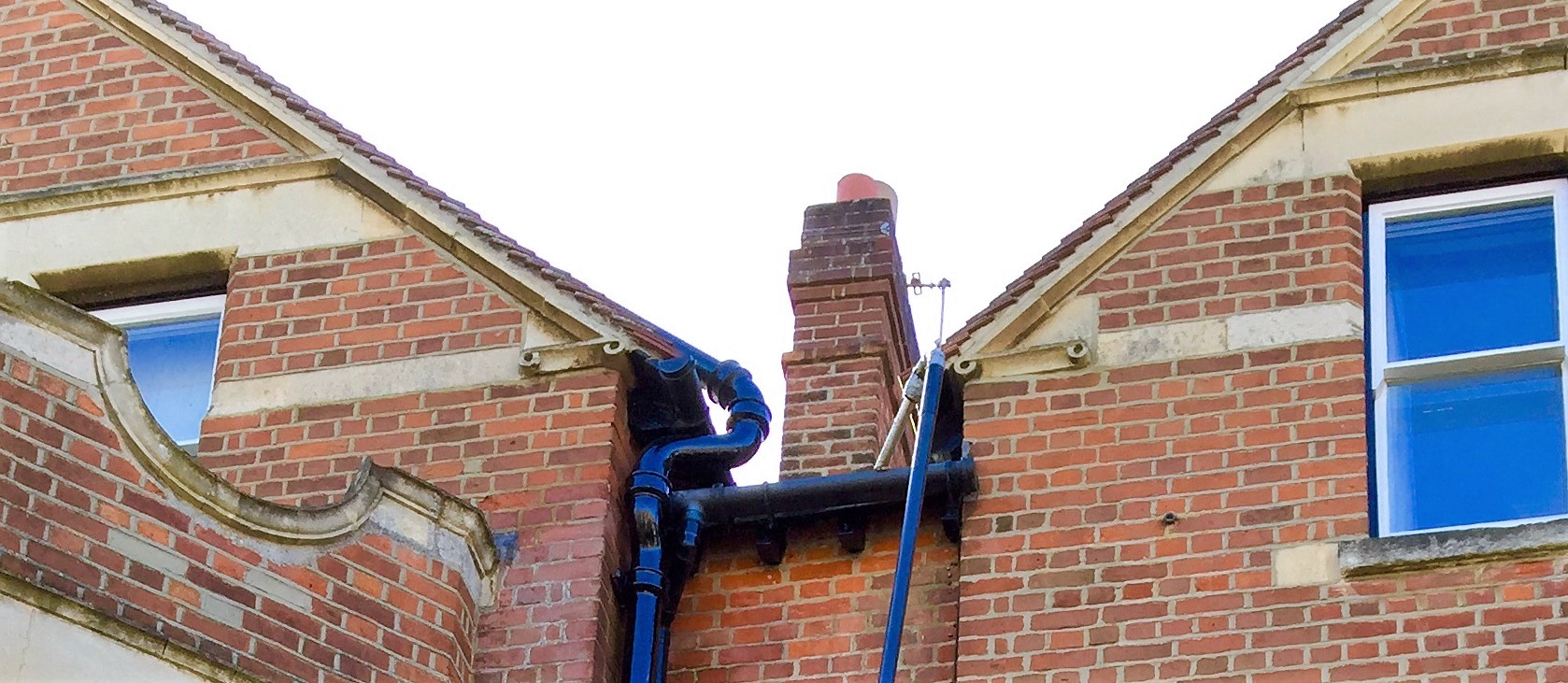 Gutter Cleaning with MetroVac for gutters Oxford Metro Rod
