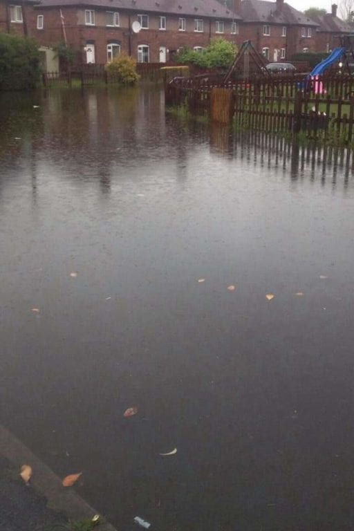Road gullies can't cope with the volume of rain! Housing Estate in Lache, Chester