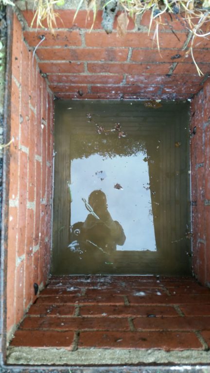 Blocked Manhole Before